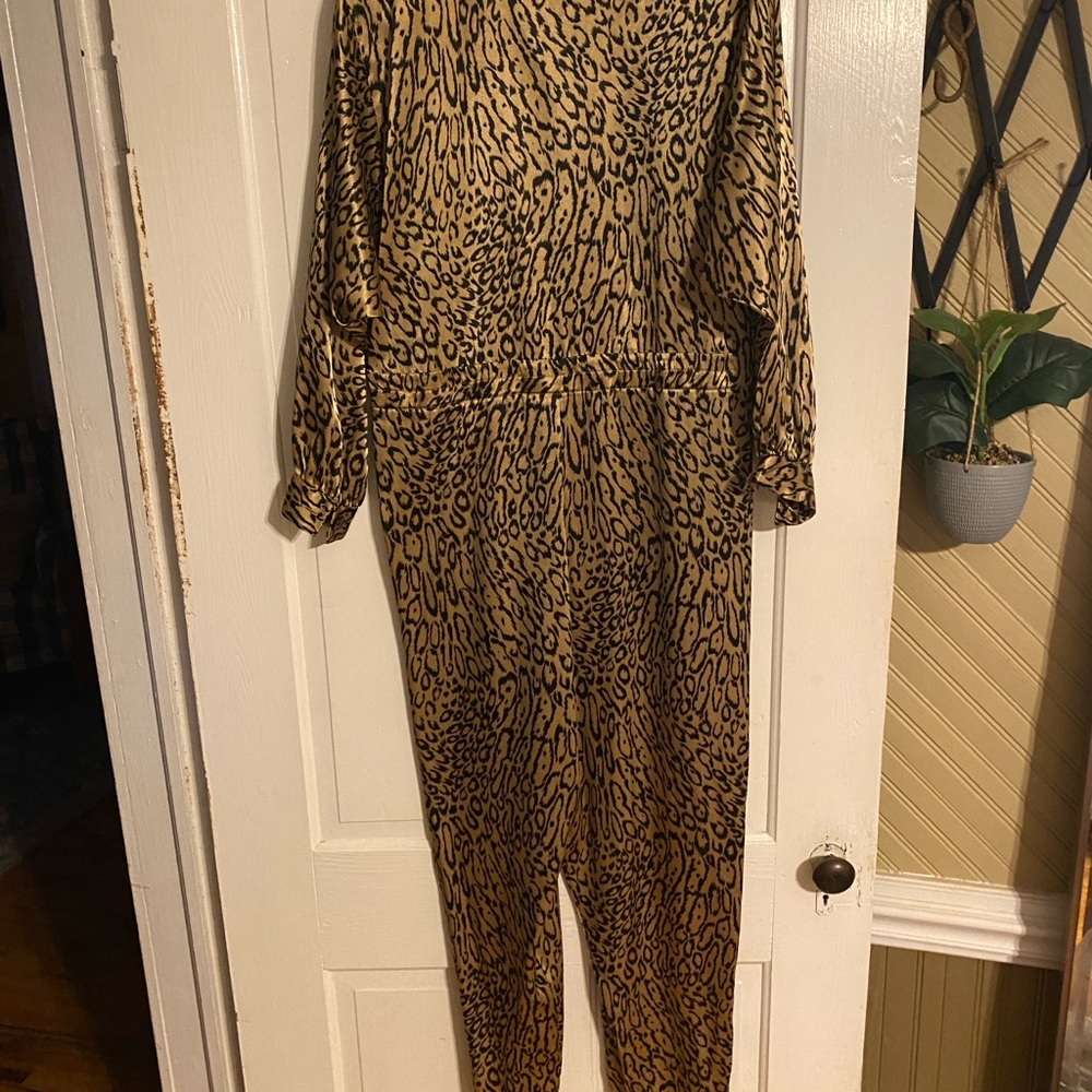 Bold Brown and Black Animal Print Jumpsuit with Long Sleeves